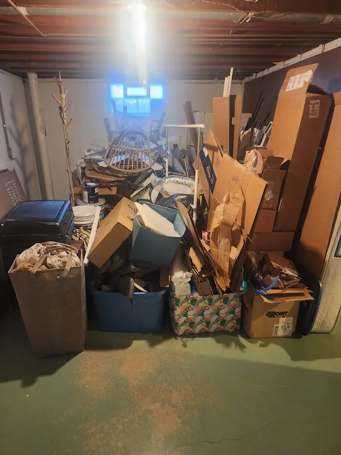 Roll-off dumpster container at job site for 20 Yard Dumpster Rental in Rice Lake